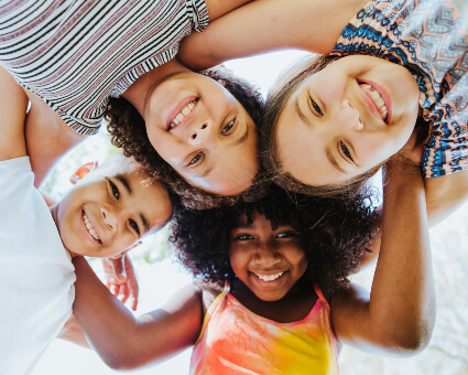 Group of children in huddle