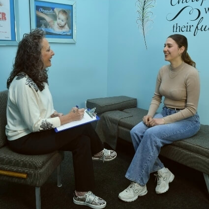 Dr Carol talking with patient