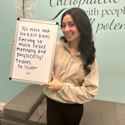 person with white board