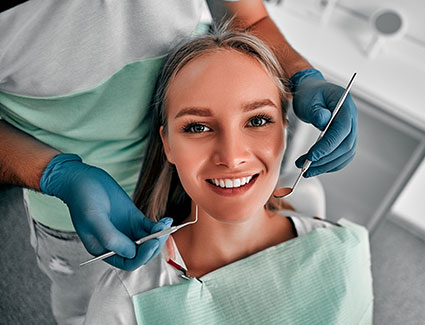 Young woman in dental chair