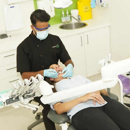 Patient getting teeth cleaned