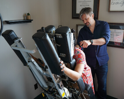 St Paul chiropractor using Activator technique to treat patent