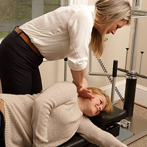 chiropractor adjusting patient