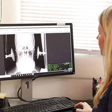 Technician viewing an xray