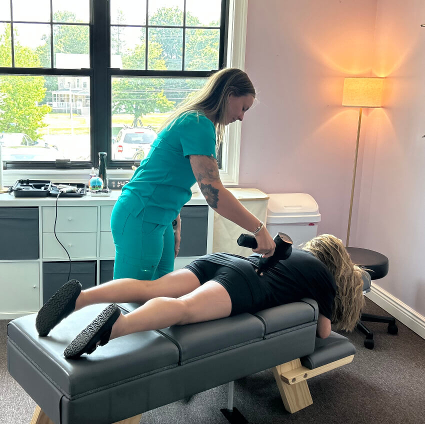 patient having their back scanned