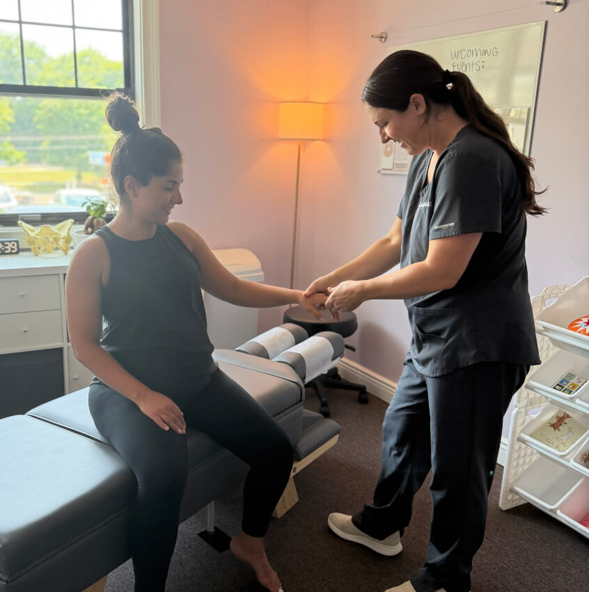patient having wrist examined