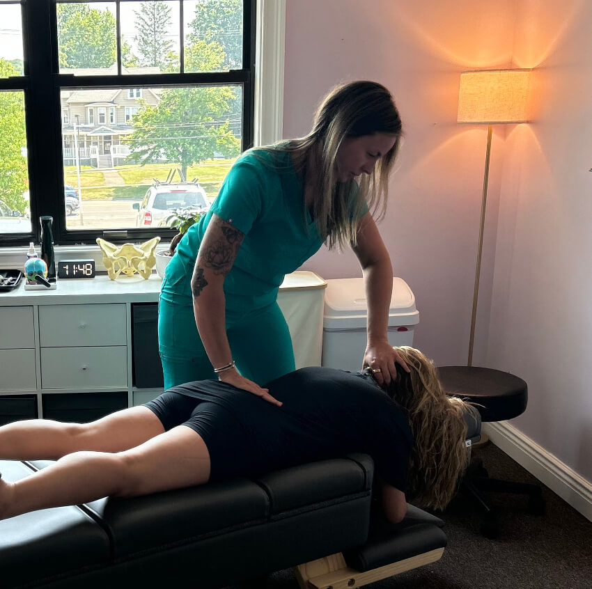patient having back adjusted