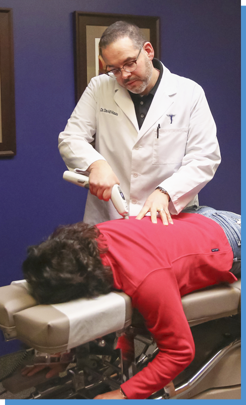 Dr. David Haas adjusting patient