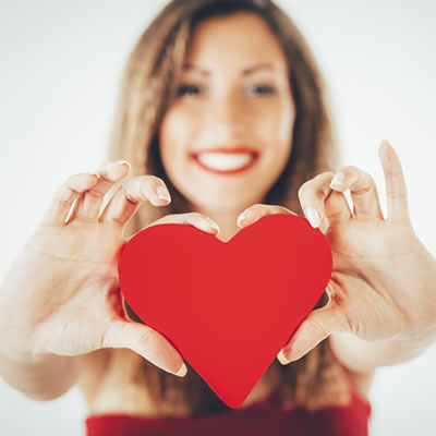 woman-holding-heart-sq400