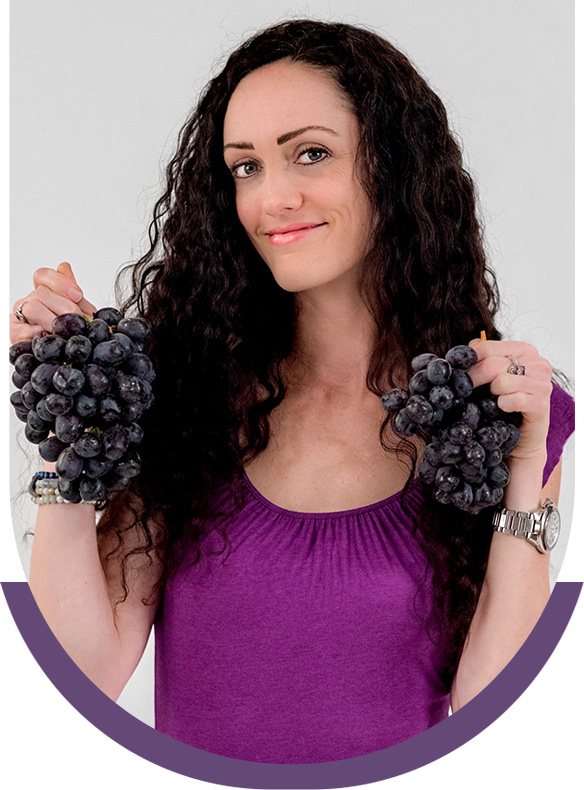 Gabrielle holding grapes