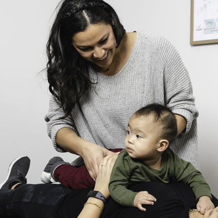 Doctor adjusting baby