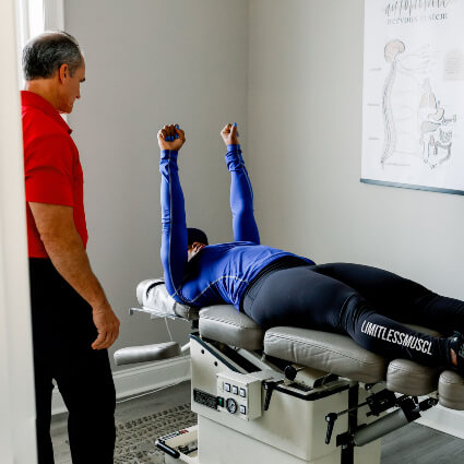 patient on table with arms up