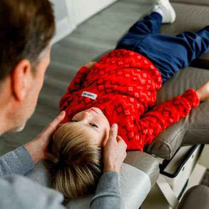 adjusting child's neck