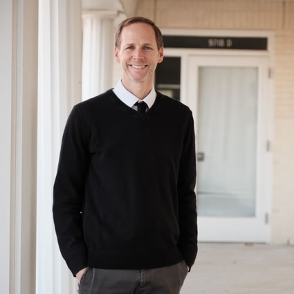 Dr. Charles Stuber standing