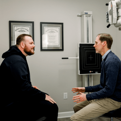 dr-with-patient-talking-in-x-ray-room