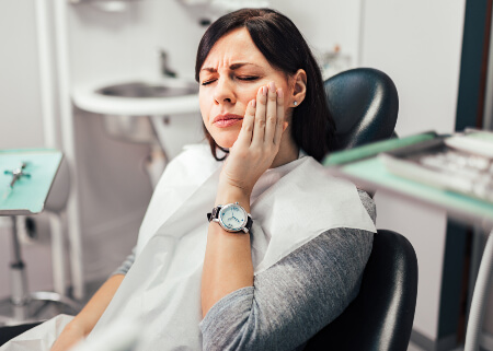 Woman with dental abscess pain