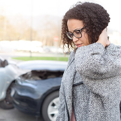 woman with a sore neck after an auto accident