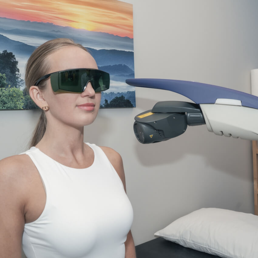 patient during laser therapy at Ritchie Chiropractic & Wellness