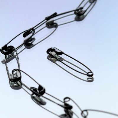 safety pins linked together