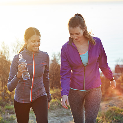 two women hiking outdoors