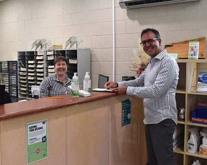 Patient at reception desk