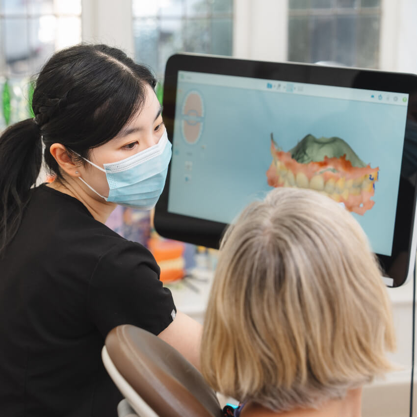 Dr Annabelle showing patient scans