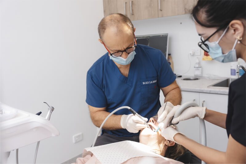 Dentist checking patient