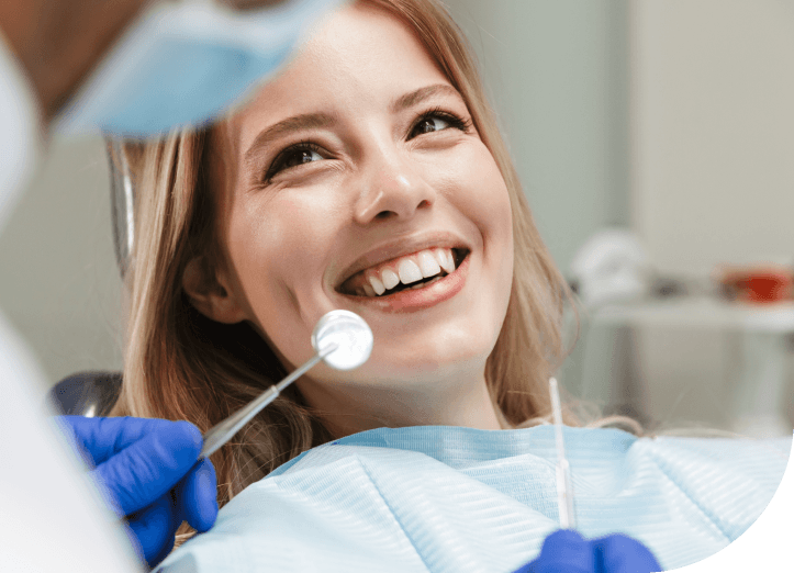 Access Dental Services dentist checking patients teeth