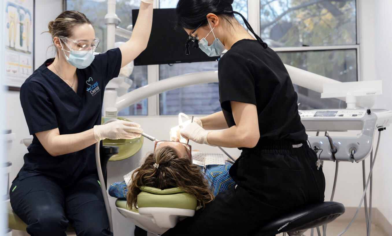 Dentist checking patient