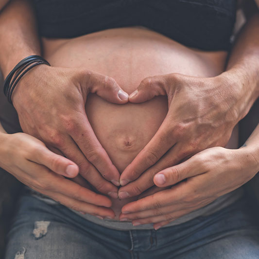 Pregnant mother and father