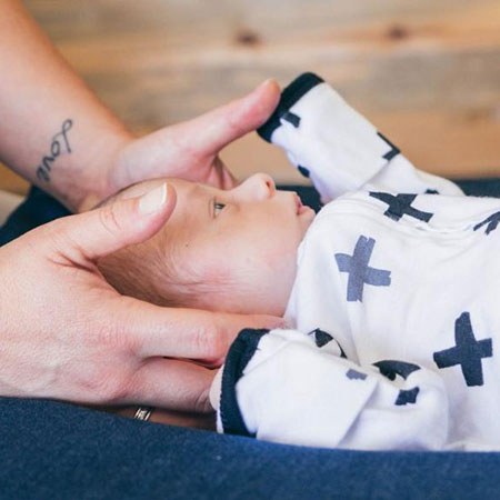 Baby getting neck adjustment