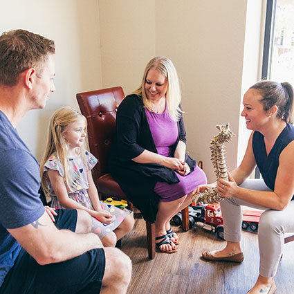 Family talking to Dr. Katie