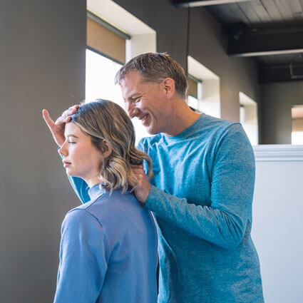 adjusting womans neck