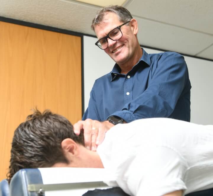 Dr. Nick adusting patient