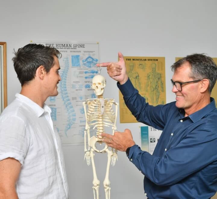 Dr. Nick showing spinal model