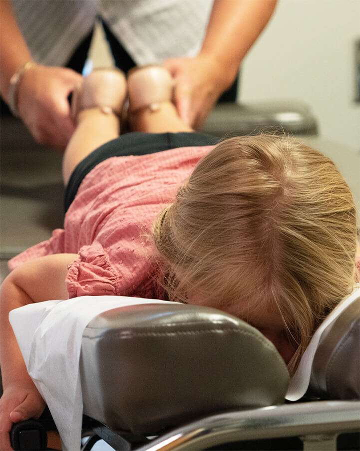 doctor adjusting child patient