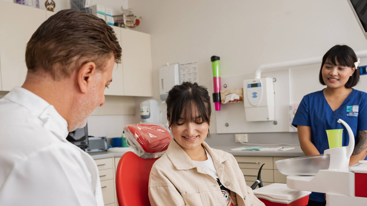 dr George explaining to female patient