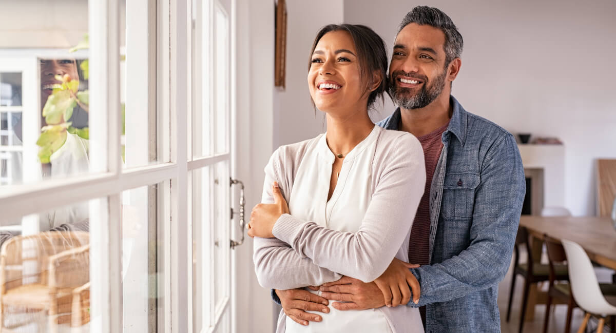 Husband and wife sharing a happy moment