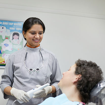 Dr. Nashi with female patient