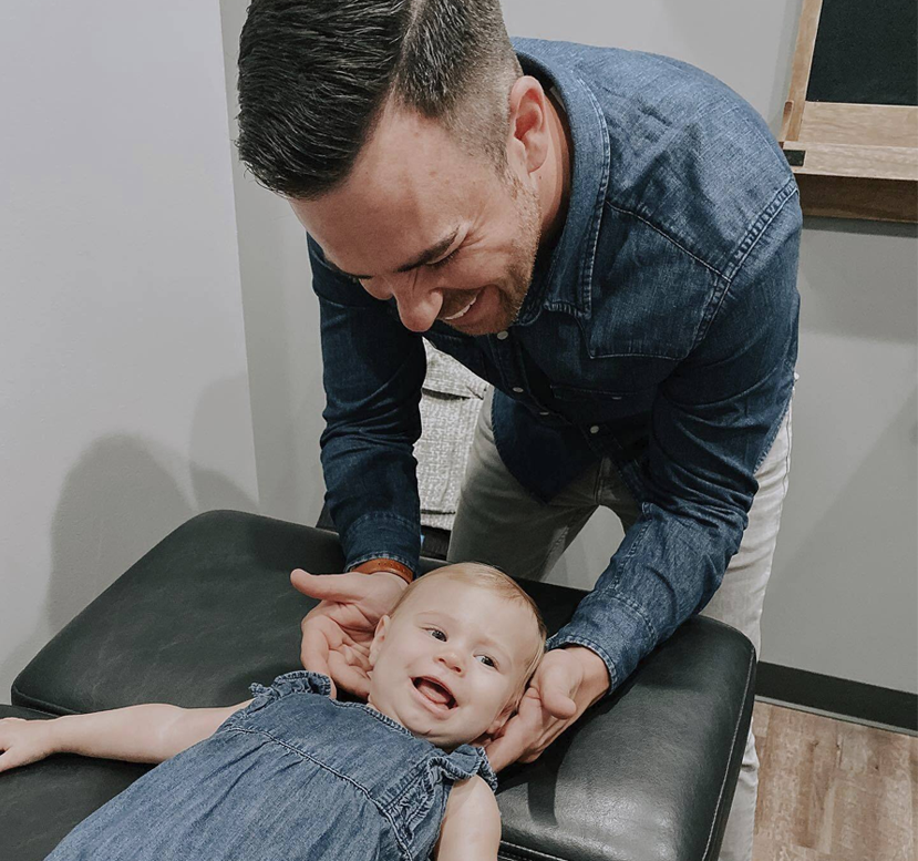 doctor adjusting baby