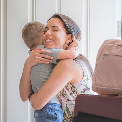 Dr Liz hugging boy