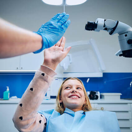 girl-high-fiving-dentist-sq