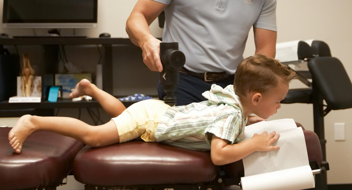 Chiropractic tool used to treat pediatric patient