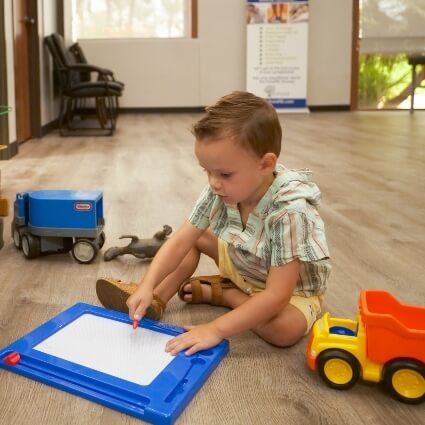 boy playing with toys