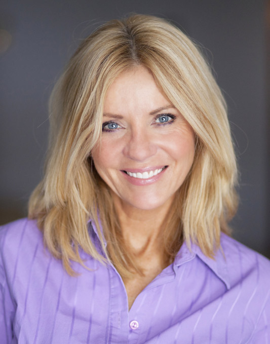 woman-smiling-with-purple-top