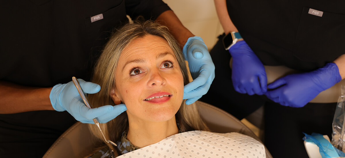 patient looking up at dentist