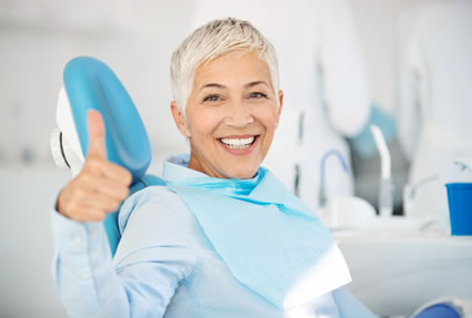 Woman satisfied dental visit