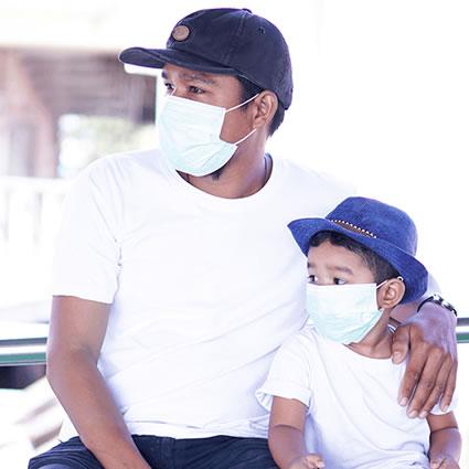 Dad and son wearing mask
