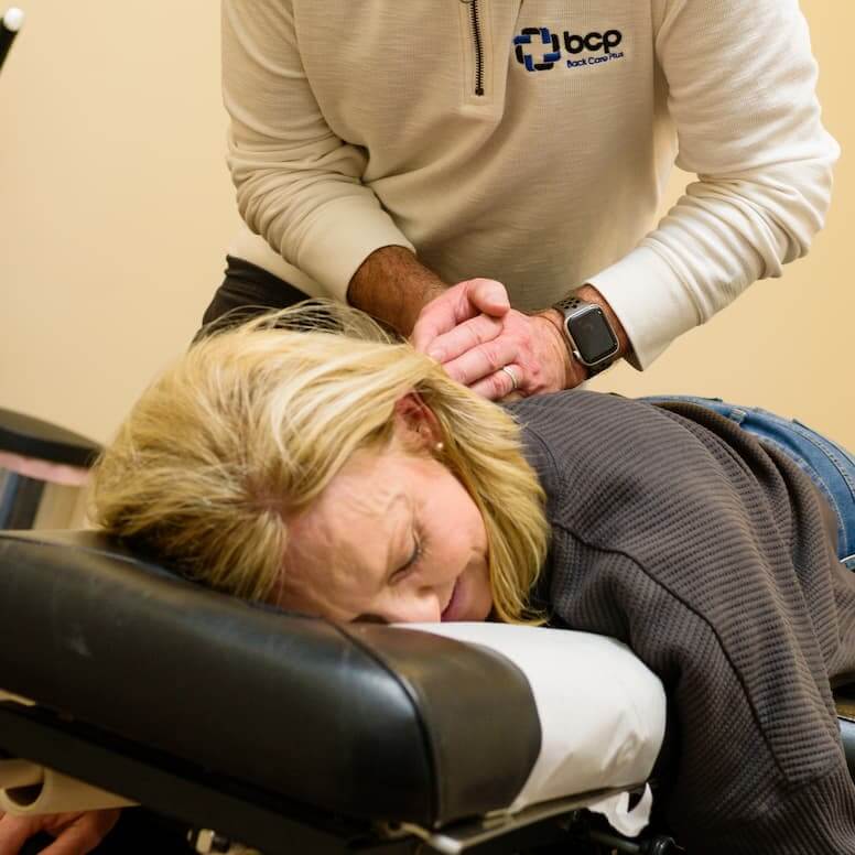 Madison chiropractor with patient