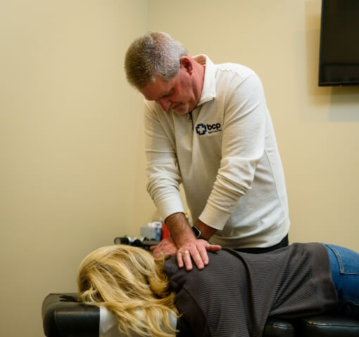 Back Care Plus patient having back adjusted
